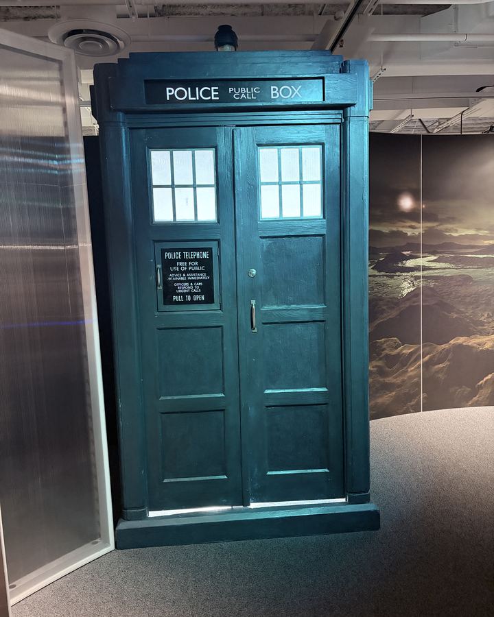A full-size TARDIS police box on display