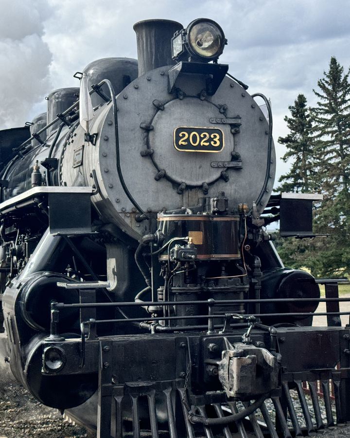 Steam locomotive number 2023 venting steam